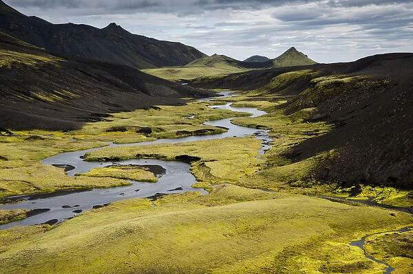 Stream with moss-covered mountains, landscape near Maelifell, Highland, Iceland, Europe