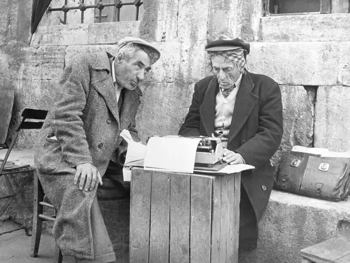 Framed Print : Street Scribe Using a Typewriter Framed Print : Street Scribe Using a Typewriter