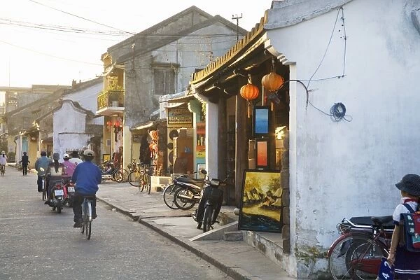 Street with shops and people in Vietnamese town