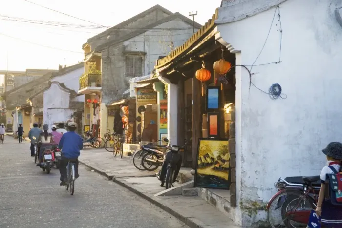 Framed Print : Street with shops and people in Vietnamese town Framed Print : Street with shops and people in Vietnamese town