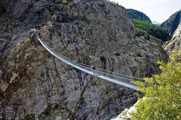 Stressed-ribbon bridge across Massa Gorge, Belalp tourism region, Canton of Valais, Switzerland