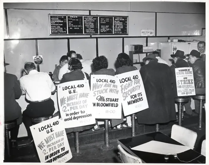 Framed Print : Strikers with Picket Signs Eat at Diner Framed Print : Strikers with Picket Signs Eat at Diner