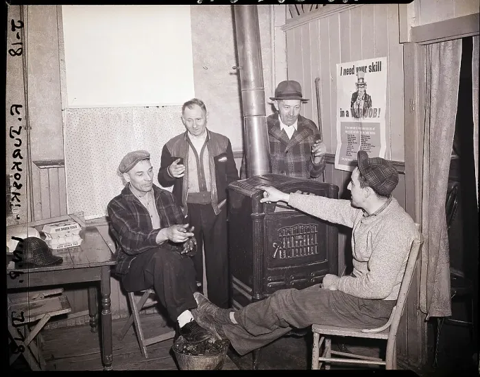 Framed Print : Striking Miners Relax by Coal Stove Framed Print : Striking Miners Relax by Coal Stove