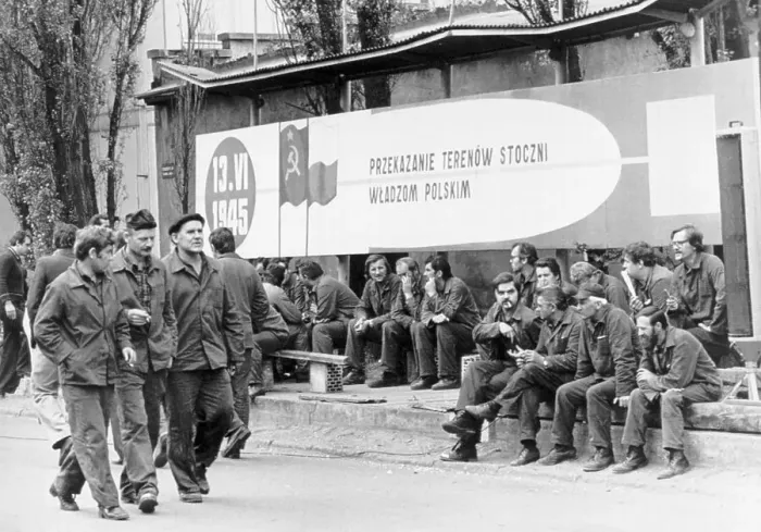 Framed Print : Striking Polish Workers Sit by Sign Framed Print : Striking Polish Workers Sit by Sign