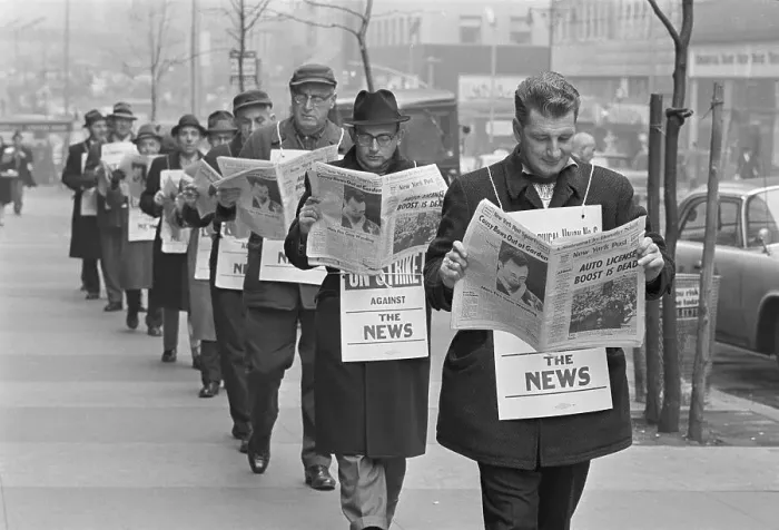 Framed Print : Striking Printers Reading Newspapers Framed Print : Striking Printers Reading Newspapers