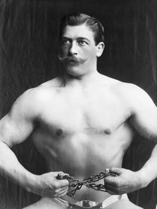 Framed Print : Strong Man Breaking a Metal Chain Framed Print : Strong Man Breaking a Metal Chain