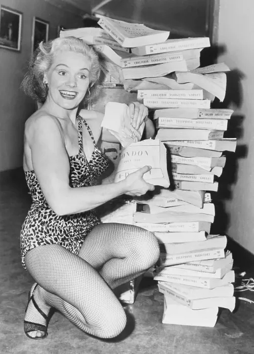 Framed Print : Strong Woman Joan Rhodes Posing by Telephone Books Framed Print : Strong Woman Joan Rhodes Posing by Telephone Books