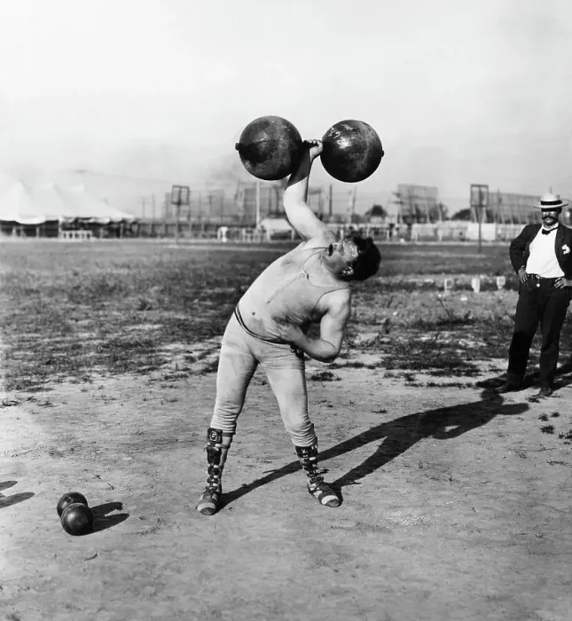 Framed Print : Strongman Lifting Dumbell Framed Print : Strongman Lifting Dumbell