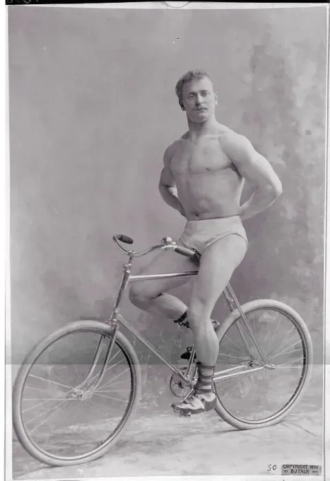 Framed Print : Strongman Sitting on Bicycle Framed Print : Strongman Sitting on Bicycle