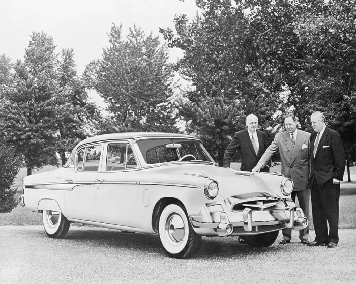 Framed Print : Studebaker-Packard Officers Posing with New Luxury Sedan