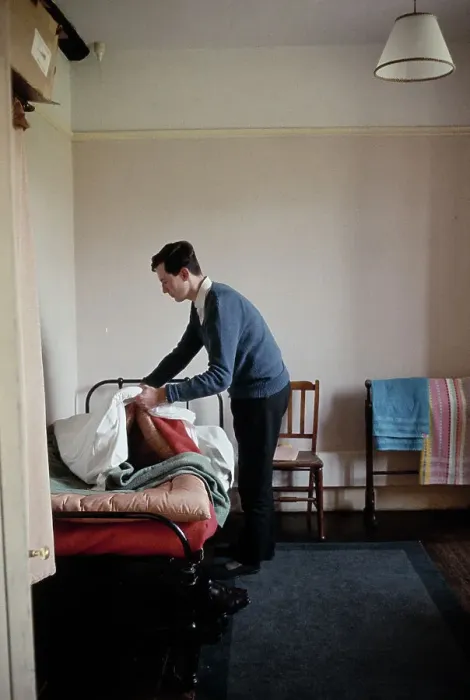 Framed Print : Student Making His Bed