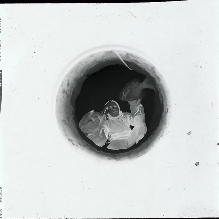 Framed Print : Student Removing Fish from Hole Framed Print : Student Removing Fish from Hole