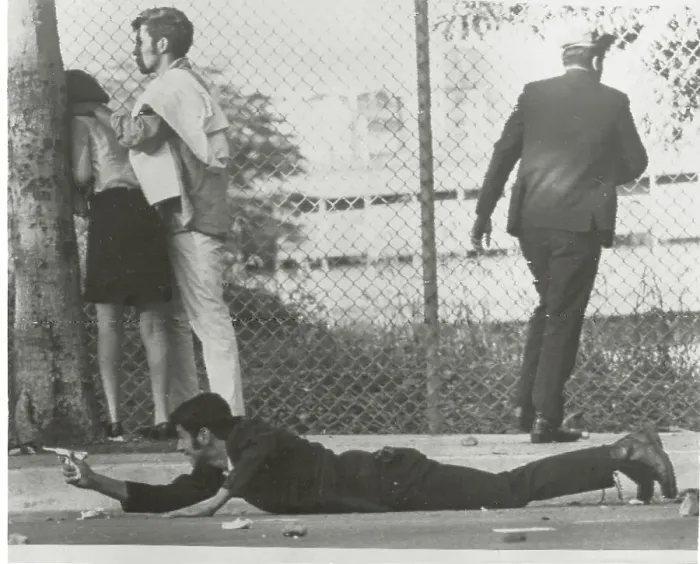 Framed Print : Student Taking Cover on the Ground Framed Print : Student Taking Cover on the Ground