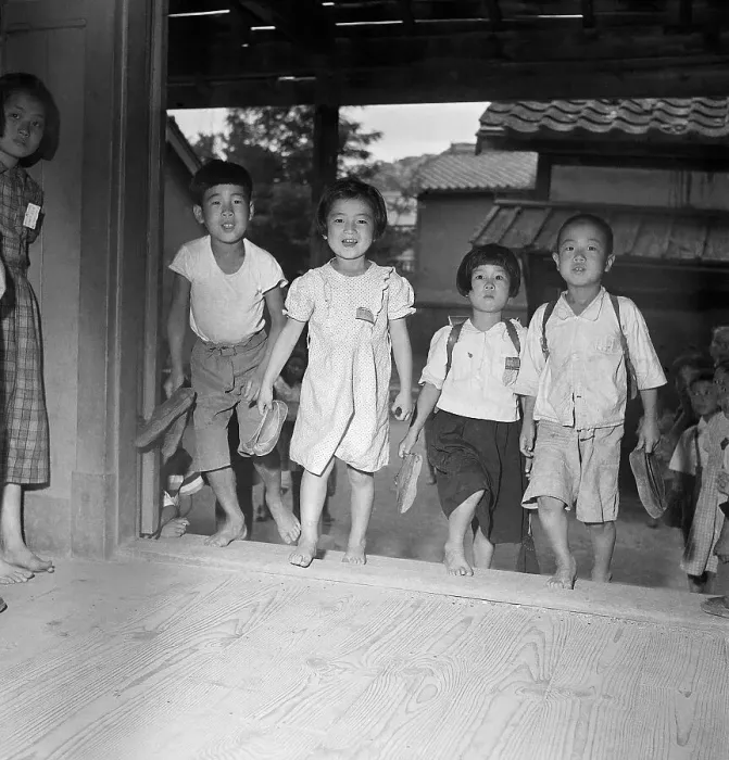 Framed Print : Students Enter Wartime Schoolhouse Framed Print : Students Enter Wartime Schoolhouse