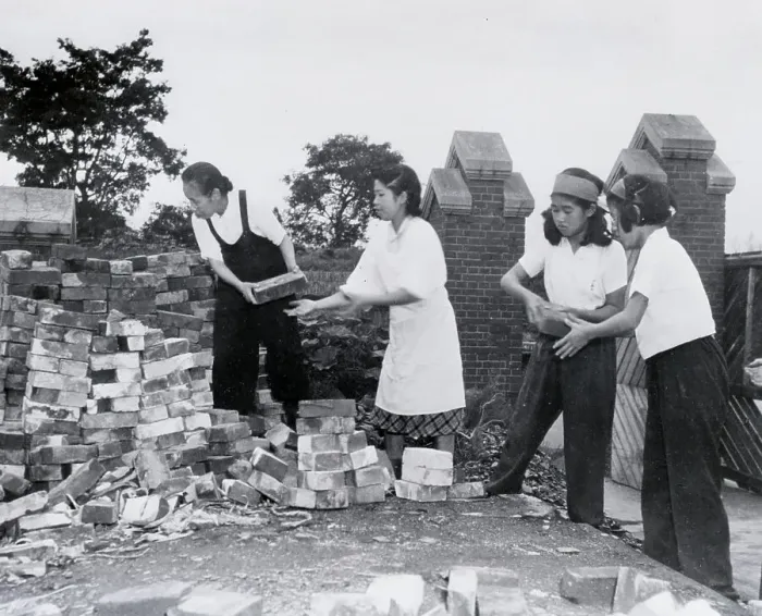 Framed Print : Students Helping to Rebuild Buildings