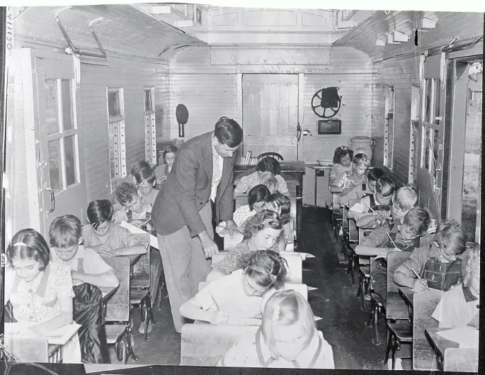 Framed Print : Students Learning in Converted Railroad Car Framed Print : Students Learning in Converted Railroad Car