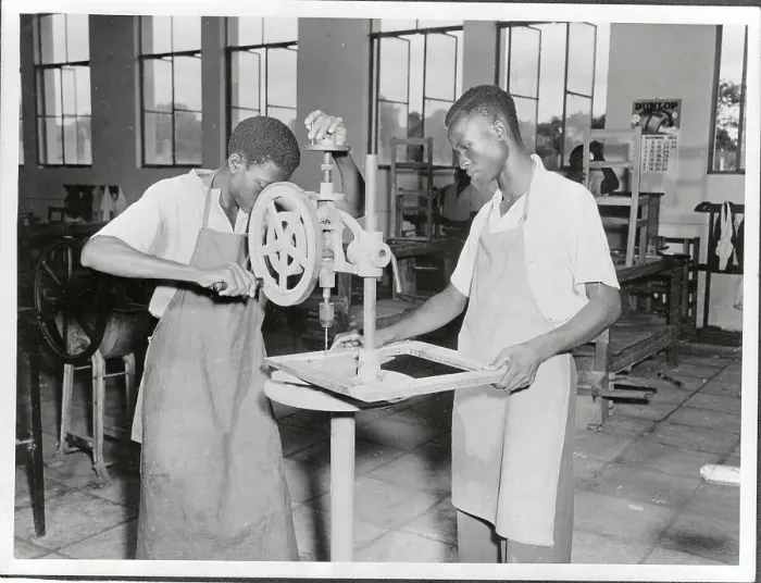 Framed Print : Students Learning How to Operate a Drill