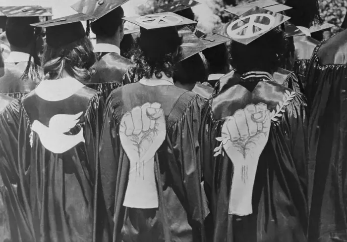 Framed Print : Students with Peace and Protest Symbols on Graduation Gowns Framed Print : Students with Peace and Protest Symbols on Graduation Gowns