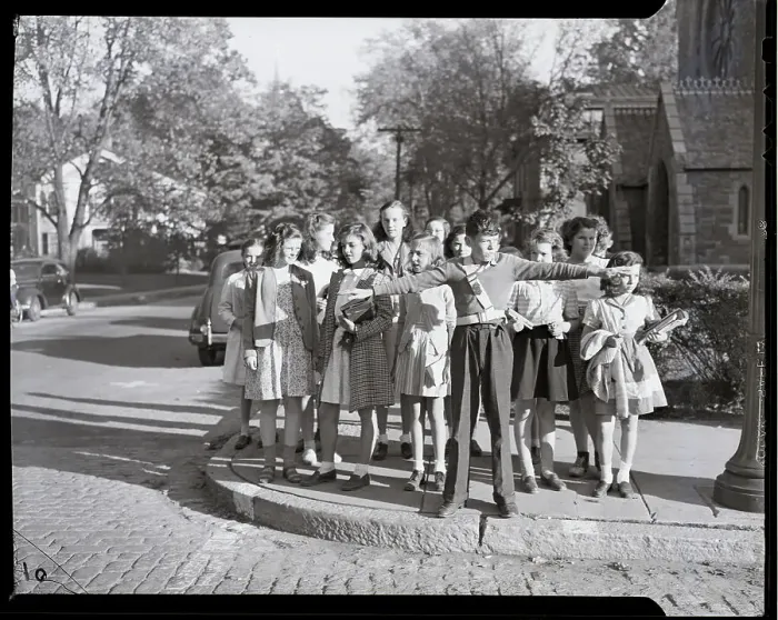 Framed Print : Students Wait to Cross the Street