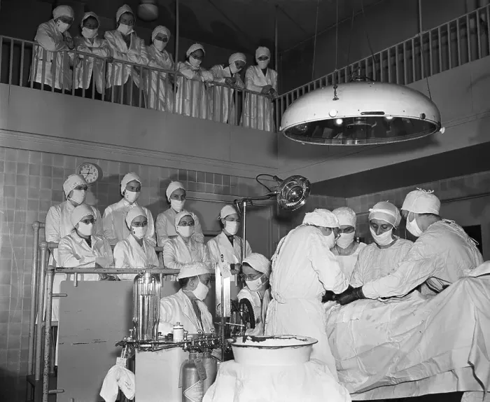 Framed Print : Students Watching Doctors Perform Surgery Framed Print : Students Watching Doctors Perform Surgery