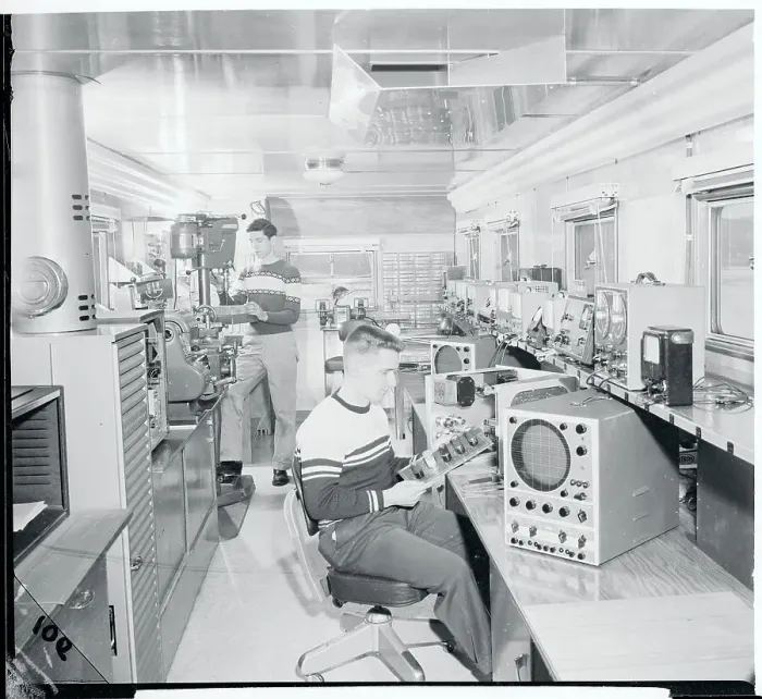Framed Print : Students Working in Laboratory on Wheels Framed Print : Students Working in Laboratory on Wheels