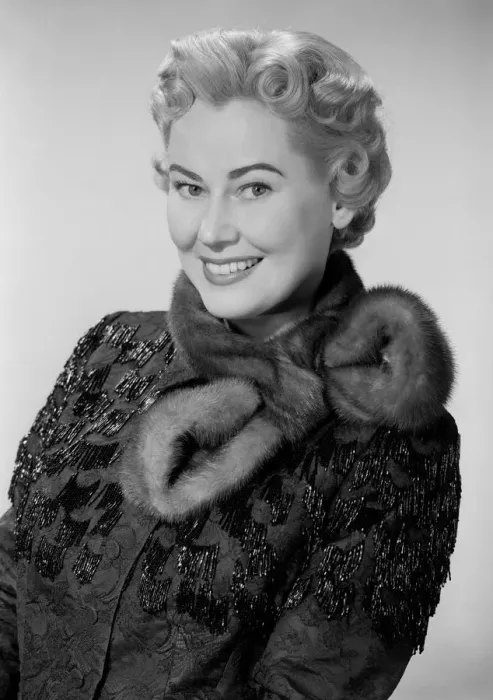 Framed Print : Studio portrait of mid adult woman wearing fur collar Framed Print : Studio portrait of mid adult woman wearing fur collar