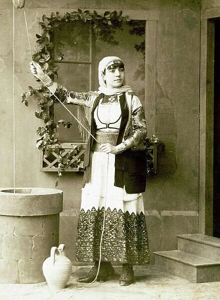 Studio portrait of a woman in traditional Greek dress beside a fountain, 1869, Greece, Historical, digitally restored reproduction from a 19th century original