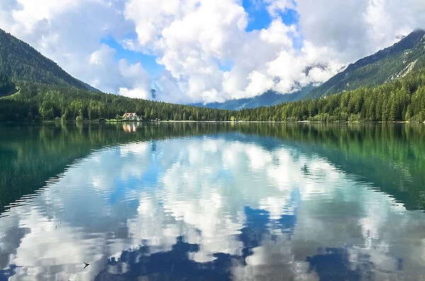 Stunning reflection in Anterselva lake, South Tyrol, Italy