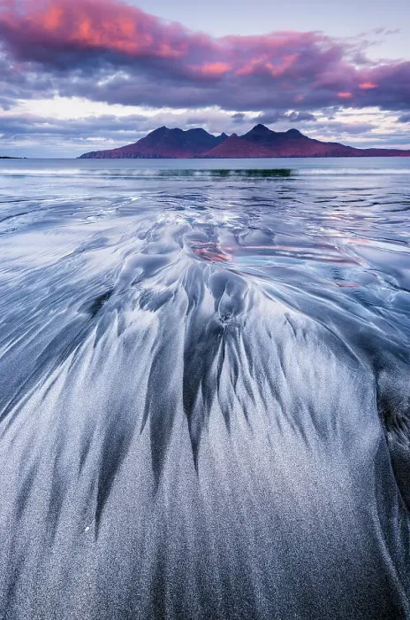 Framed Print : Stunning sand formations on the Isle of Eigg with the Isle of Rum in the distance. Scotland
