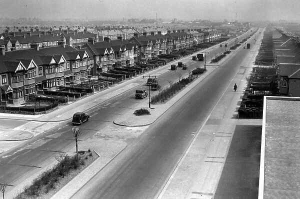Suburbia. April 1936: A typical 1930s suburban street in Ilford, London