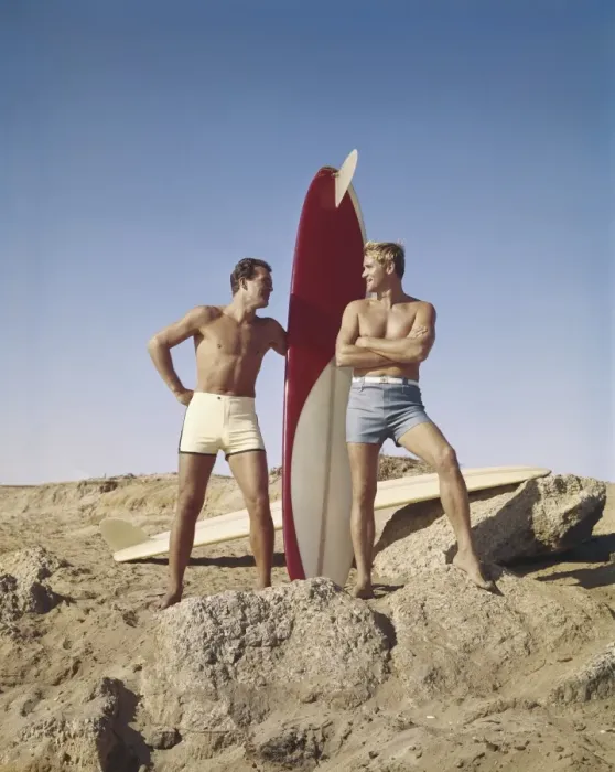Framed Print : Sufers with surfboard standing on beach, smiling Framed Print : Sufers with surfboard standing on beach, smiling