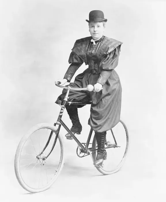 Framed Print : Suffragette Dressed in Man's Hat on Bicycle Framed Print : Suffragette Dressed in Man's Hat on Bicycle