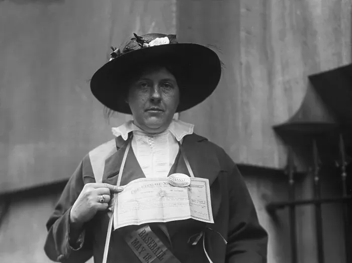 Framed Print : Suffragette Pointing to Sign on Her Neck Framed Print : Suffragette Pointing to Sign on Her Neck