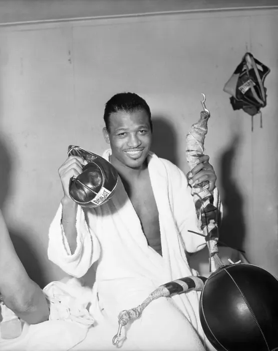 Framed Print : Sugar Ray Robinson with Broken Boxing Bag Framed Print : Sugar Ray Robinson with Broken Boxing Bag