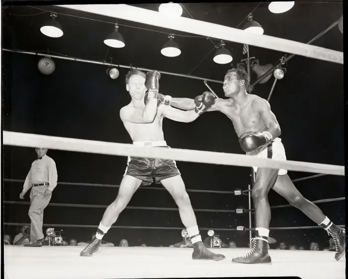 Framed Print : Sugar Ray Robinson Delivering Punch Framed Print : Sugar Ray Robinson Delivering Punch