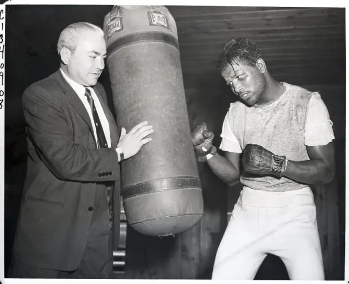 Framed Print : Sugar Ray Robinson Punching Bag at Training Framed Print : Sugar Ray Robinson Punching Bag at Training