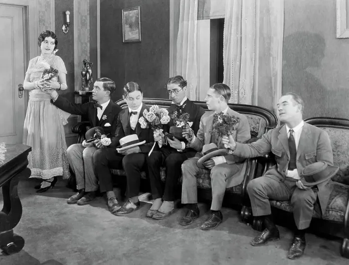 Framed Print : Suitors Sitting on Couches with Flowers Framed Print : Suitors Sitting on Couches with Flowers