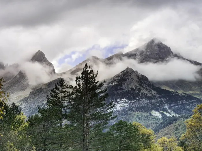 Framed Print : Summits of high mountains with snow in autumn and clouds of storm, in a valley of the Pyrenees Framed Print : Summits of high mountains with snow in autumn and clouds of storm, in a valley of the Pyrenees