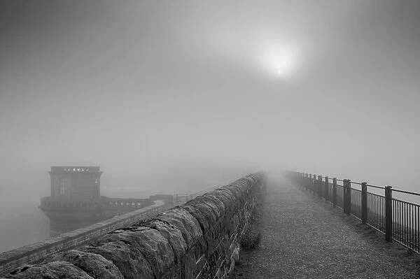 Sun in the mist at Ladybower dam