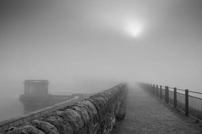 Framed Print : Sun in the mist at Ladybower dam