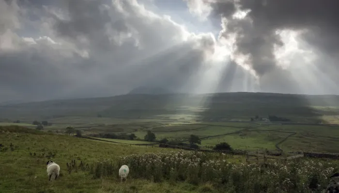 Framed Print : Sun Rays. Sun breaking through clouds in the Yorkshire Dales