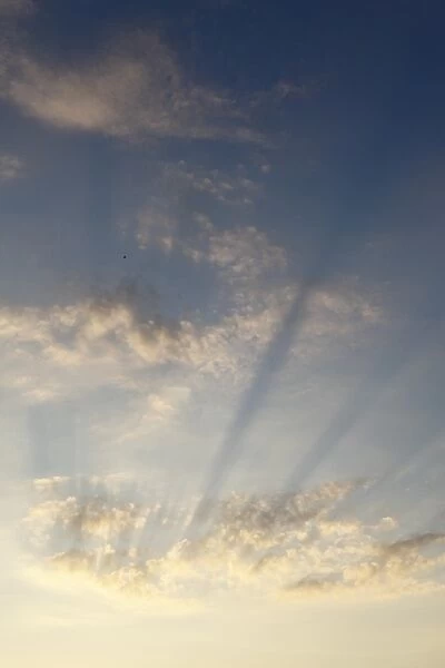 Sun rays in the cloudy sky, Ireland, Europe