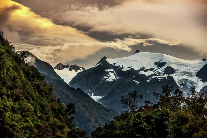 Framed Print : The sun setting over the Franz Josef glacier located on the south island of New Zealand Framed Print : The sun setting over the Franz Josef glacier located on the south island of New Zealand