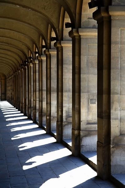Sun shining through colonnade