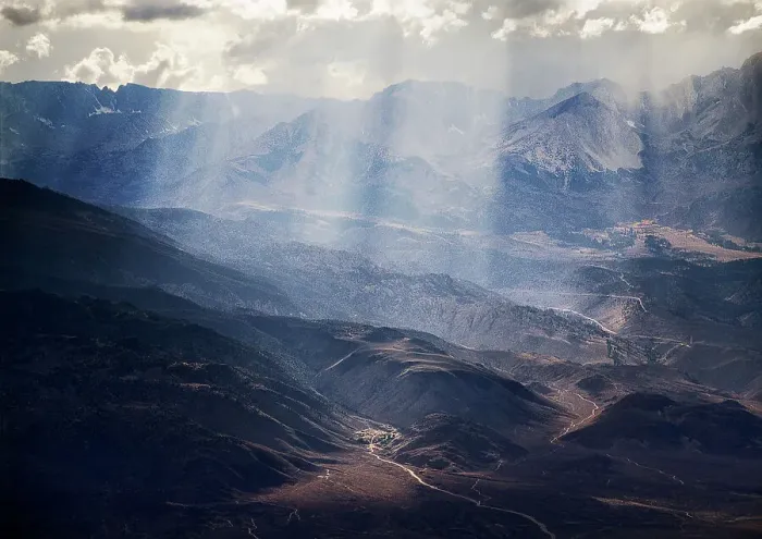 Framed Print : Sun shining above mountains and valleys Framed Print : Sun shining above mountains and valleys