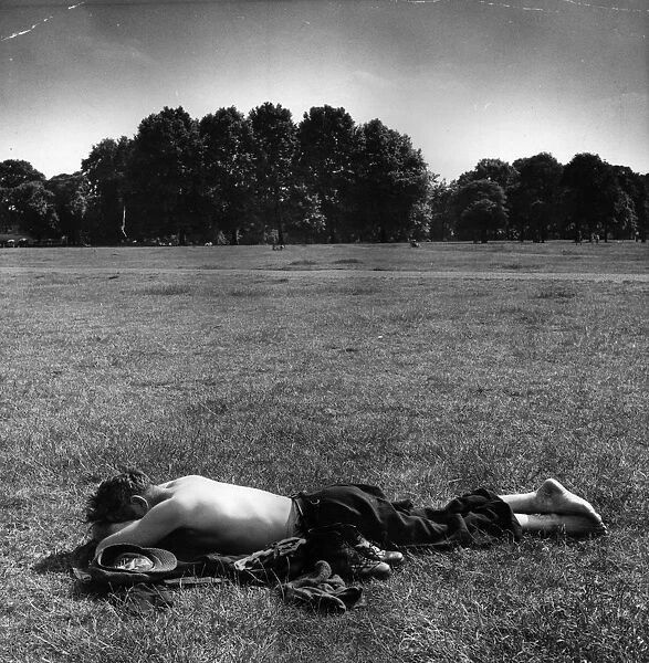 Sunbather. A man sunbathing in Londons Hyde Park