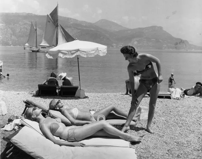 Framed Print : Sunbathing On Beach