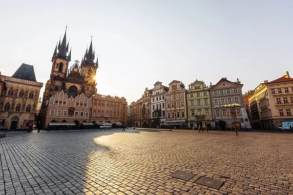 Sunbeam shining through the towers of Tyn Church at the Old Town Square, Prague, Czech Republic