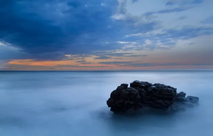 Framed Print : Sunrise landscape of ocean with waves clouds and rocks on beach Framed Print : Sunrise landscape of ocean with waves clouds and rocks on beach