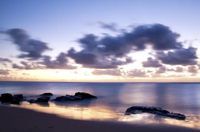 Framed Print : Sunrise landscape of ocean with waves clouds and rocks on beach Framed Print : Sunrise landscape of ocean with waves clouds and rocks on beach